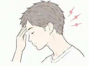 頭痛に悩む人のイラスト